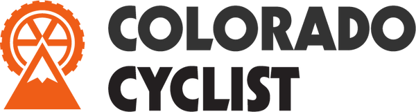 Logo with orange circular design and mountain silhouette next to 'COLORADO CYCLIST' text.